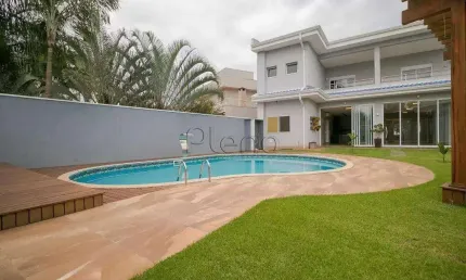 Sobrado à venda em campinas, jardim do sol, com 3 suítes, com 472 m², condomínio riviera barão
