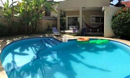 Casa em condomínio fechado com 4 quartos para alugar no Balneário Praia do Pernambuco, Guarujá 