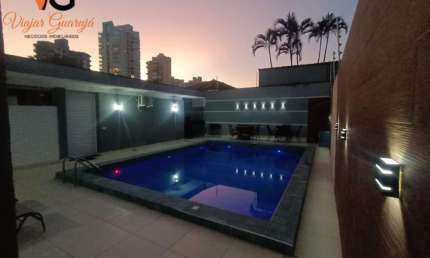 Casa Térrea para Venda em Guarujá, Jardim Virgínia, 4 dormitórios, 3 suítes, 6 banheiros, 4 vagas