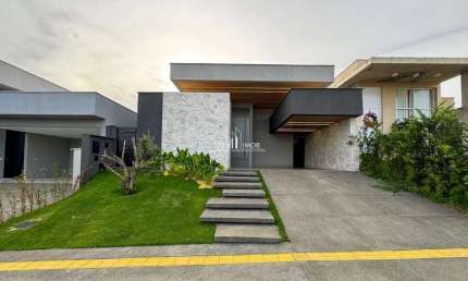Casa térrea com 3 suítes sendo uma master com closet e banheira.