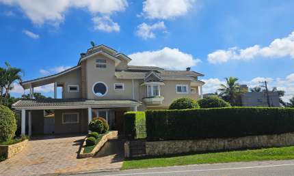 Casa condomínio fechado Aruã Ecopark, 4 suites, excelente localização 
