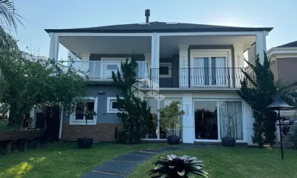 Casa em condomínio fechado com 3 quartos à venda na Avenida Juca Batista, 9000, Belém Novo, Porto Alegre