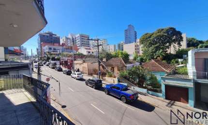 Apartamento Central com 3 Dormitórios, Sacada e Garagem – Próximo à UFN e Av. Pr