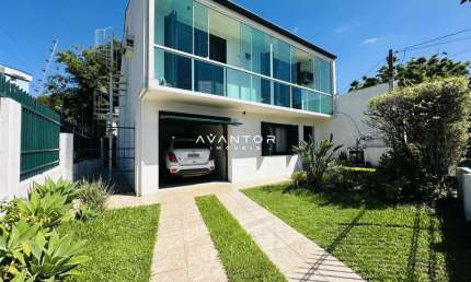 Casa com 3 dormitórios, espaço gourmet e salão de jogos