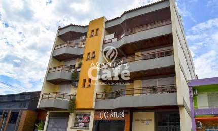 Apartamento com 3 dormitórios, sala, cozinha, terraço e 2 vagas de garagem.