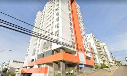 Apartamento de 2 dormitórios no centro de Santa Maria com box de garagem