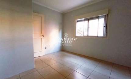 Apto 2 dormitórios, sala, cozinha, área de serviço e garagem