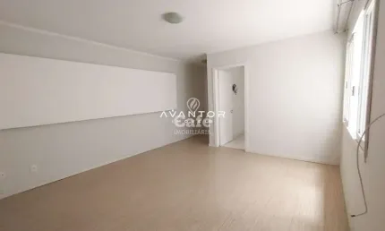 Apartamento Central com 3 dormitórios, Espaço gourmet e box garagem.