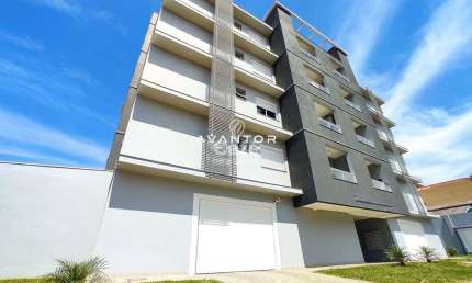 Apartamento 2 dormitórios com suíte, sacada e box garagem