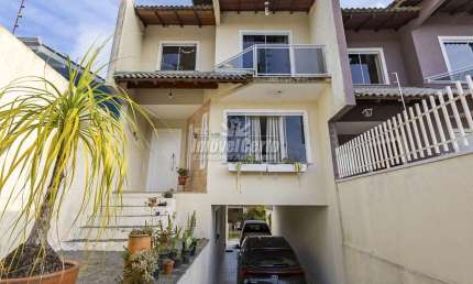 Casa com 3 quartos à venda na Rua Coronel Wallace Scott Murray, 853, Santa Cândida, Curitiba, 133 m2 por R$ 690.000