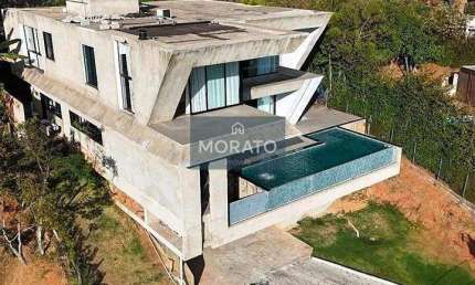 Casa com 4 quartos sendo 4 suítes e 6 vagas no Condomínio Mirante da Mata em Nova Lima.