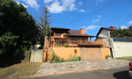 casa com 3 dormitórios sendo uma suíte, no bairro Ouro Branco