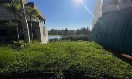 Terreno em condomínio frente para o lago, Horizon-EV