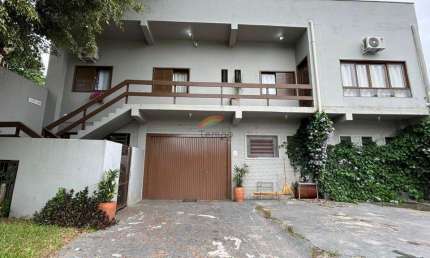 Casa comercial ou residencial, 03 dormitórios, sendo uma suíte, bairro Pátria Nova, Novo Hamburgo-RS.