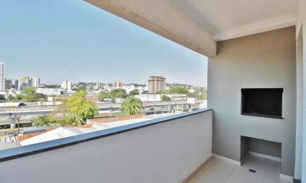 apartamento 2 dormitórios com suíte, sacada com churrasqueira e box no bairro Ideal