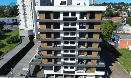 Apartamento bairro pátria nova 2 dormitório  com suíte sacada com churrasqueira e garagem coberta