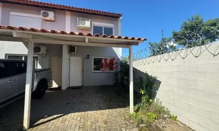 Casa em condomínio fechado com 2 quartos para alugar na Rua Barão de Mauá, 300, Fátima, Canoas por R$ 1.400