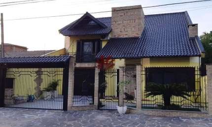Casa com 3 quartos à venda na Rua João Nicolau, 109, Fátima, Canoas por R$ 1.490.000