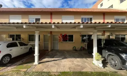 Casa em condomínio fechado com 2 quartos para alugar na Rua Treze de Maio, 601, Rio Branco, Canoas por R$ 1.300