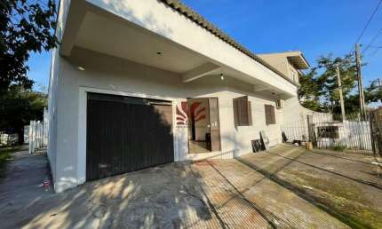 Casa com 4 quartos para alugar na Avenida Doutor Severo da Silva, 803, Estância Velha, Canoas por R$ 4.000