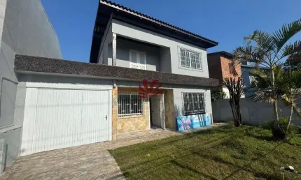 Casa com 4 quartos para alugar na Rua Boa Saúde, 1174, Rio Branco, Canoas por R$ 2.800