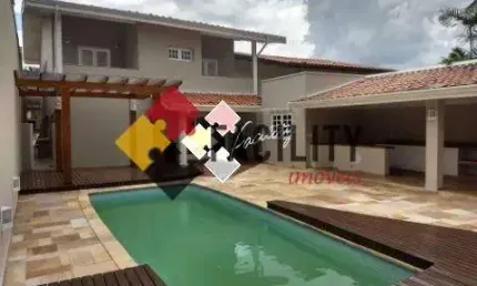 Casa em condomínio fechado com 5 quartos à venda na rua eliseu teixeira de camargo, 909, sítios de recreio gramado, campinas, 420 m2 por r$ 1.800.000