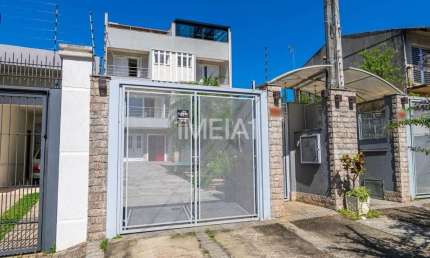 Casa com 4 quartos para alugar na Rua Arnaldo Ballve, 512, Jardim Itu Sabará, Porto Alegre por R$ 8.000