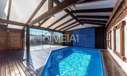 Casa com 4 quartos para alugar na Rua Indianápolis, 240, Três Figueiras, Porto Alegre por R$ 8.000