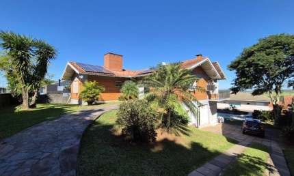 Vista deslumbrante em casa com dois terrenos no Bairro Petrópolis NH