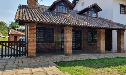 Residência em estilo rústico em terreno de  1.216, m² Bairro Industrial, NH