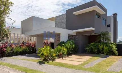 Casa a venda no condomínio Bosque dos Jatobás, em Jundiaí SP, 3 suítes, escritório, piscina aquecida, área gourmet, closet, 4 vagas.