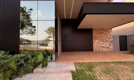 Casa térrea, no Condomínio Alphaville 1, com 3 suítes, 267m²