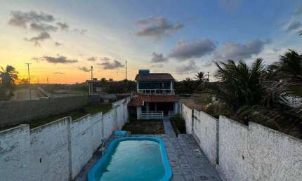 Casa à Beira-Mar em Tabatinga: Próximo à Lagoa de Arituba - 3 dormitórios à venda, 210 m² - Nísia Floresta/RN - CA0503