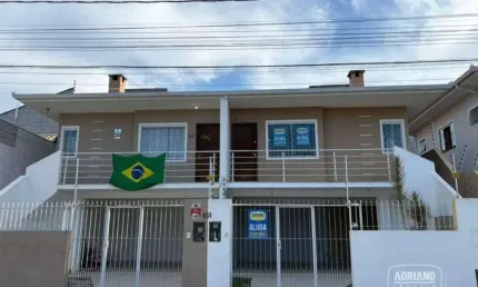 Casa com 3 dormitórios para alugar, 120 m² por R$ 3.461,65/mês - Potecas - São José/SC