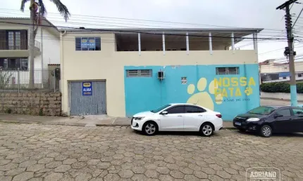 Casa com 4 dormitórios para alugar, 180 m² por R$ 5.293,68/mês - Estreito - Florianópolis/SC