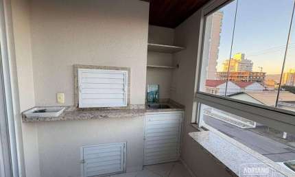 Apartamento com 2 dormitórios para alugar, 69 m² por R$ 4.232,36/mês - Barreiros - São José/SC
