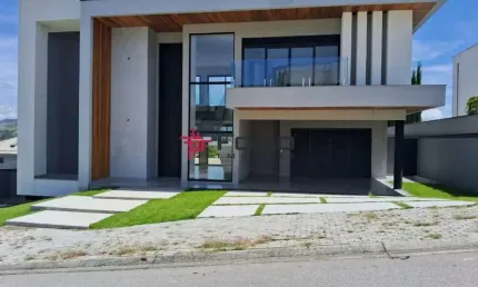 Lindo sobrado alto padrão no Colinas do Paratehy Norte com AC420m², 4 suítes, área gourmet integrada, piscina com borda infinita, churrasqueira.