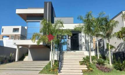 CASA Alto padrão no CONDOMÍNIO ALPHAVILLE II  com AT 480m², AC 290m², 3 suítes, paisagismo, aquecimento solar