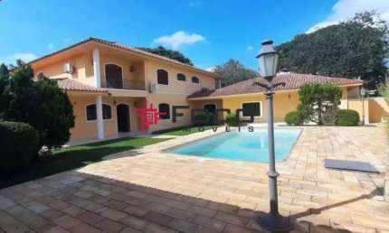 Casa com 4 suítes, 706m2 de terreno por R$ 4.000.000,00 - Jardim Apolo