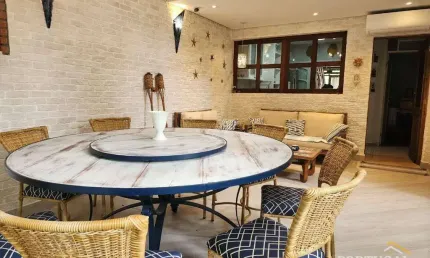 Village com 3 dormitórios à venda, 130 m² por R$ 2.660.000,00 - Riviera Módulo 21 - Bertioga/SP