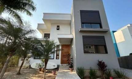 Casa em condomínio fechado com 4 quartos à venda no Cachoeira do Bom Jesus, Florianópolis  por R$ 2.395.000