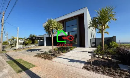 Casa de 4 Suítes em Condomínio de Alto Padrão em Monte Alegre, Vinhedo-SP: 452m², 3 Salas, 6 Banheiros e 4 Vagas.