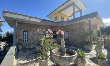Locação e Venda de Casa - Padrão no bairro Pontal de Santa Marina em Caraguatatuba/SP