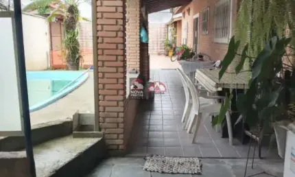 Casa com 3 quartos à venda na Rua Girassol, 215, Travessão, Caraguatatuba