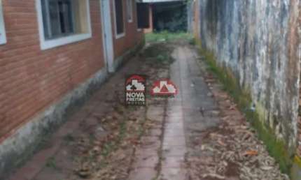Casa com 4 quartos à venda na Rua Nove, 10, Tabatinga, Caraguatatuba