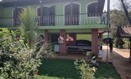 Casa com 5 quartos à venda na Rua Doutor Carlos Adalberto Garcia, 220, Martim de Sá, Caraguatatuba