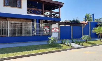 Casa com 4 quartos à venda na Avenida Pavão, 130, Capricórnio I, Caraguatatuba