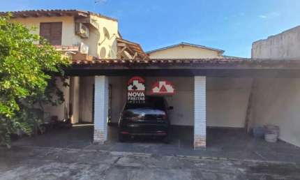 Sobrado com cinco dormitórios sendo quatro suites  e escritório no Porto Novo em Caraguatatuba