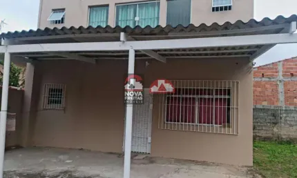 Sobrado a 100 metros da orla da praia Porto Novo, rua asfaltada. Local tranquilo e seguro. Com 3 dormitórios