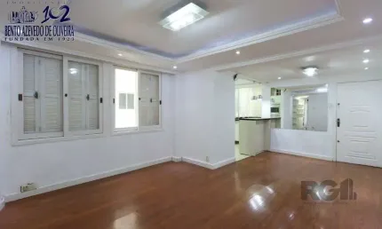 Apartamento semi-mobiliado, possui 3 dormitórios, sendo 1 suíte